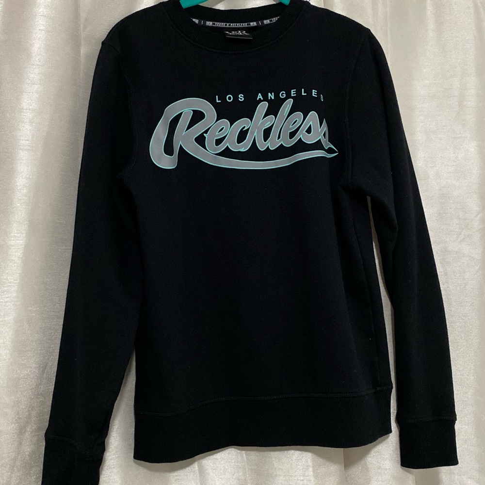 Young and reckless crew neck